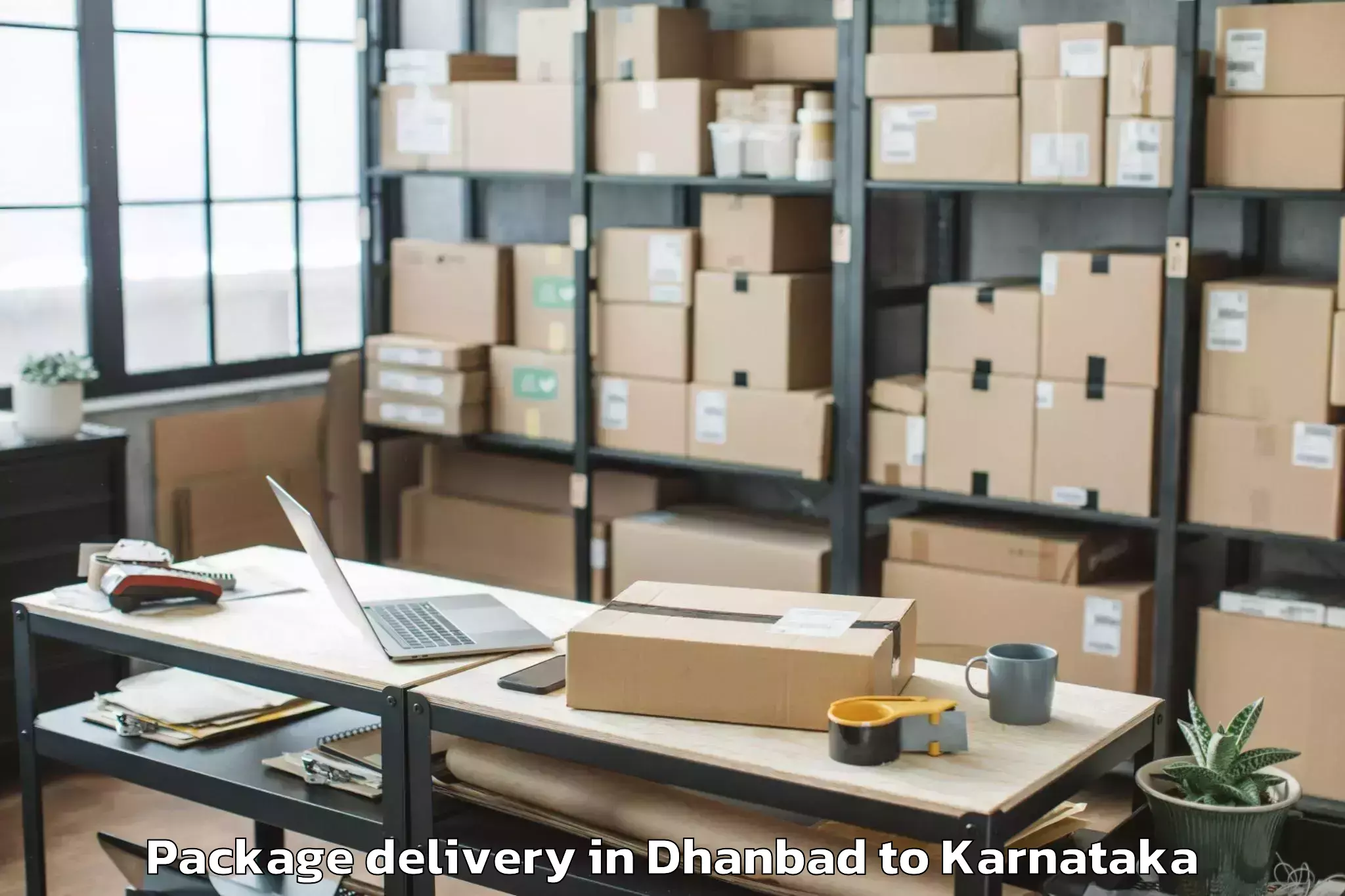 Top Dhanbad to Shirhatti Package Delivery Available